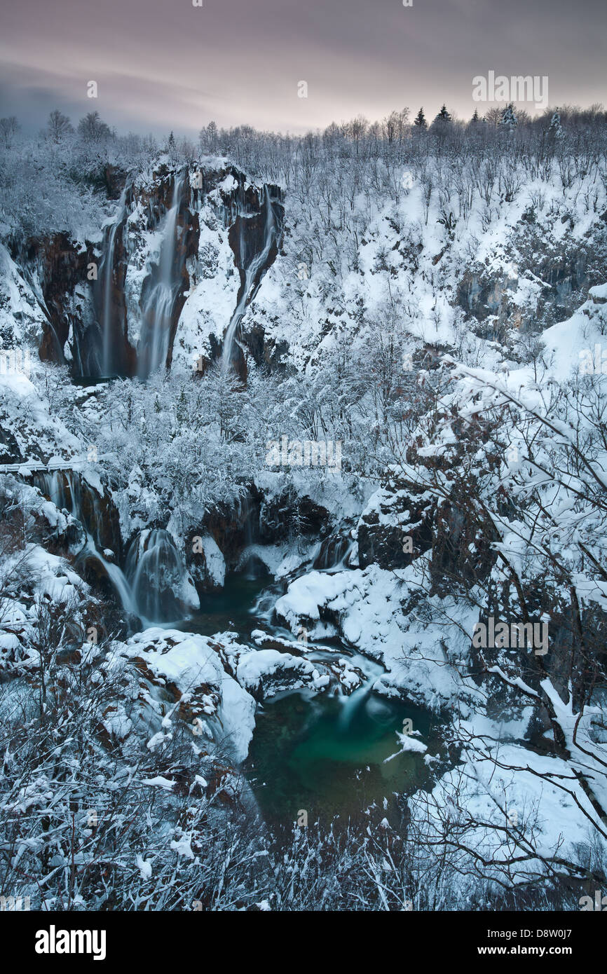 Plitvice Lakes Big Waterfall in winter snow, National Park Plitvice Lakes, Croatia Stock Photo