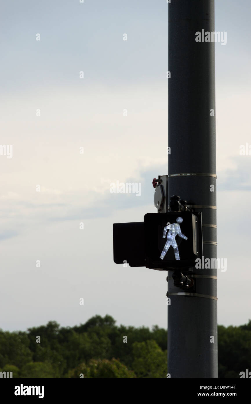 Pedestrian Walk signal at a small town traffic intersection. Stock Photo