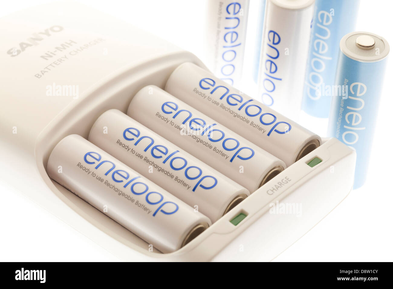 Sanyo Eneloop rechargeable batteries in charger Stock Photo