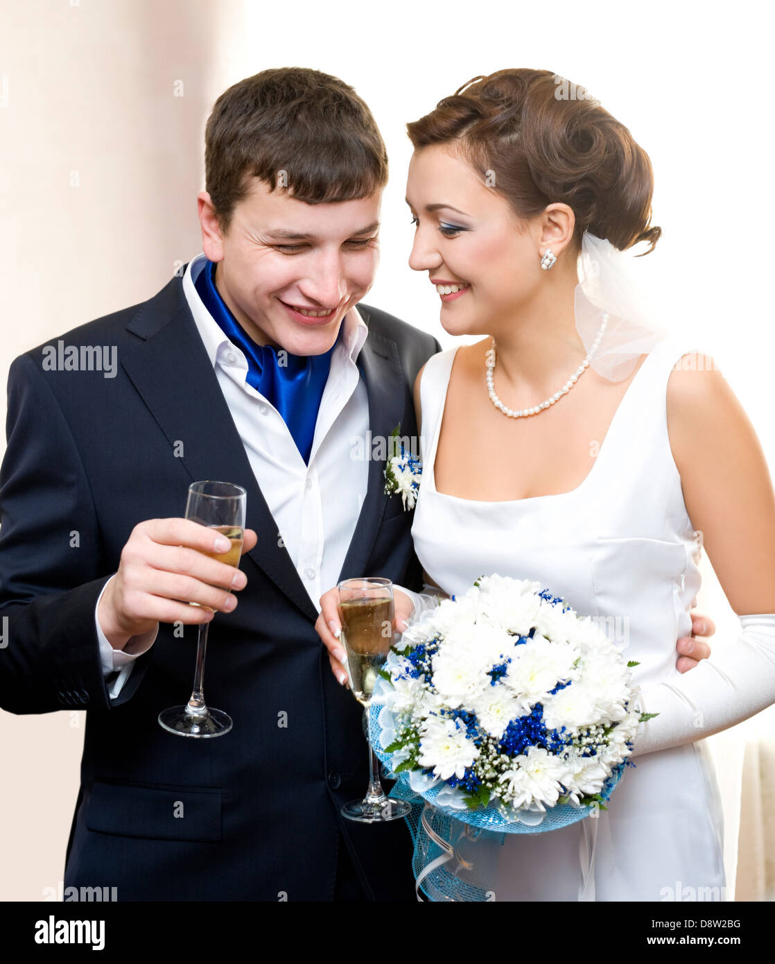 bridegroom and bride with champagne Stock Photo