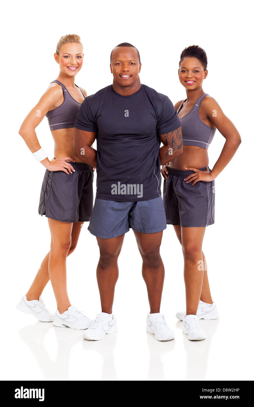 smiling group of personal trainers on white background Stock Photo