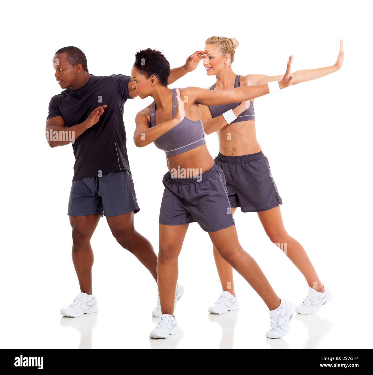 group of young adult doing fitness dance exercise on white background Stock Photo