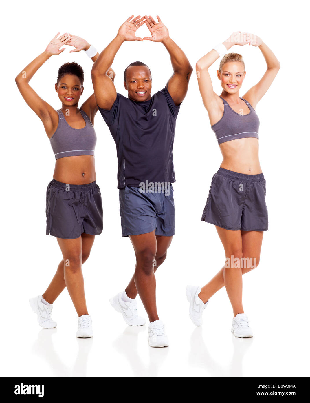 group of cheerful people stretching to warm-up, isolated on white background Stock Photo