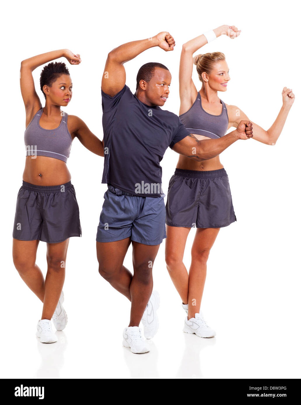 cheerful young adults working out over white background Stock Photo