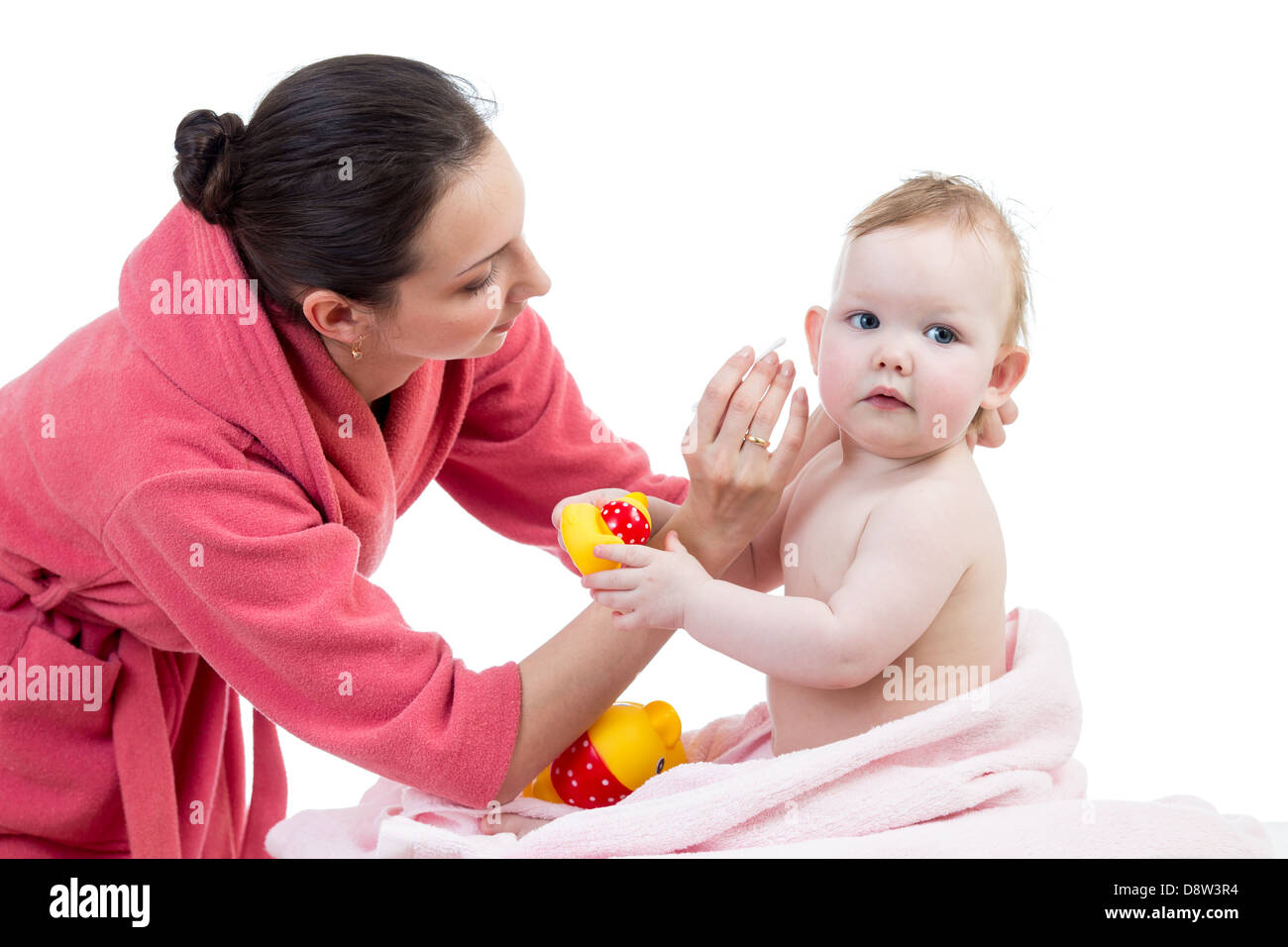 mother cleaning ears her baby after bathing Stock Photo Alamy