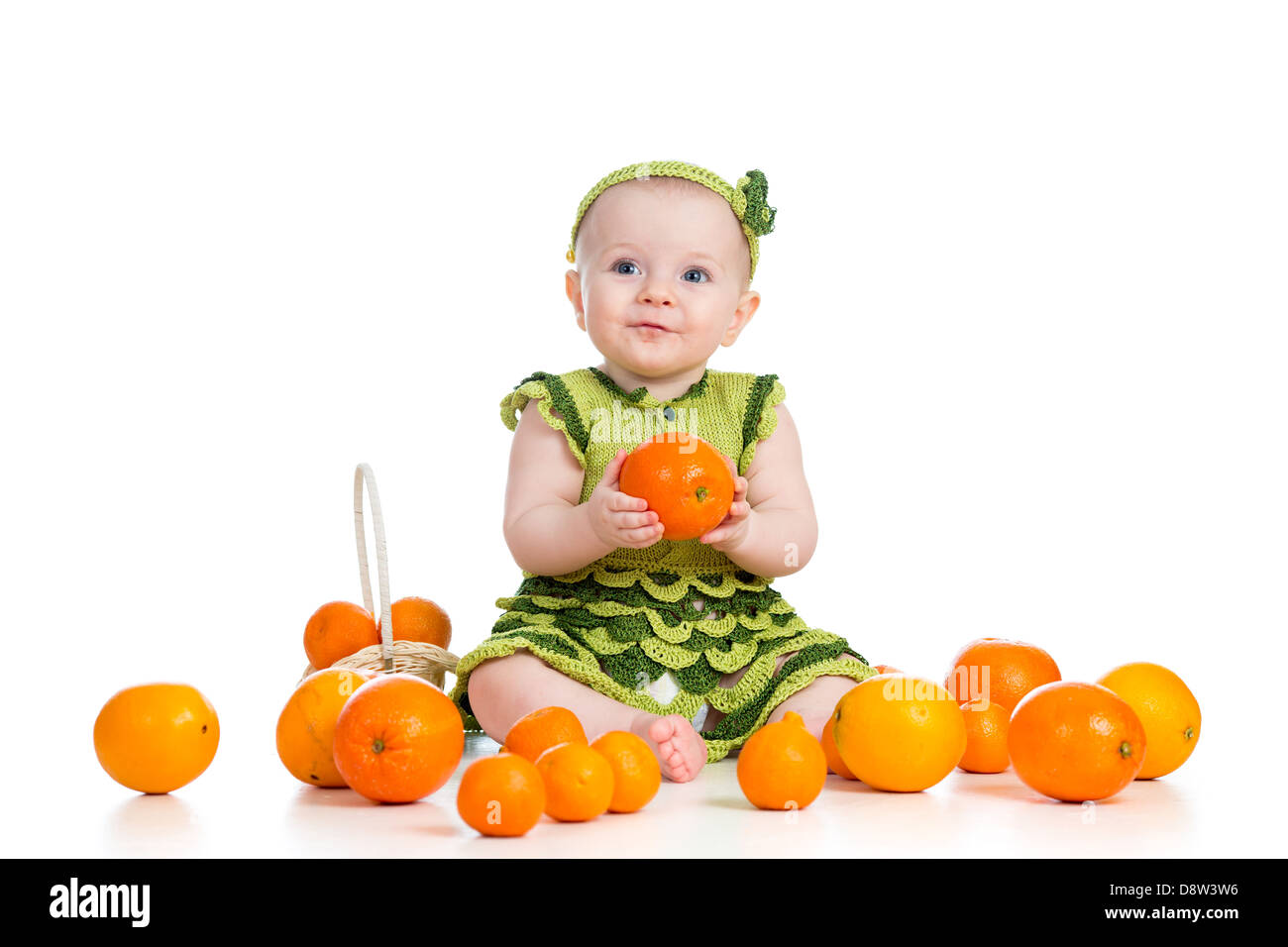 happy baby girl with fruits isolated on white background Stock Photo