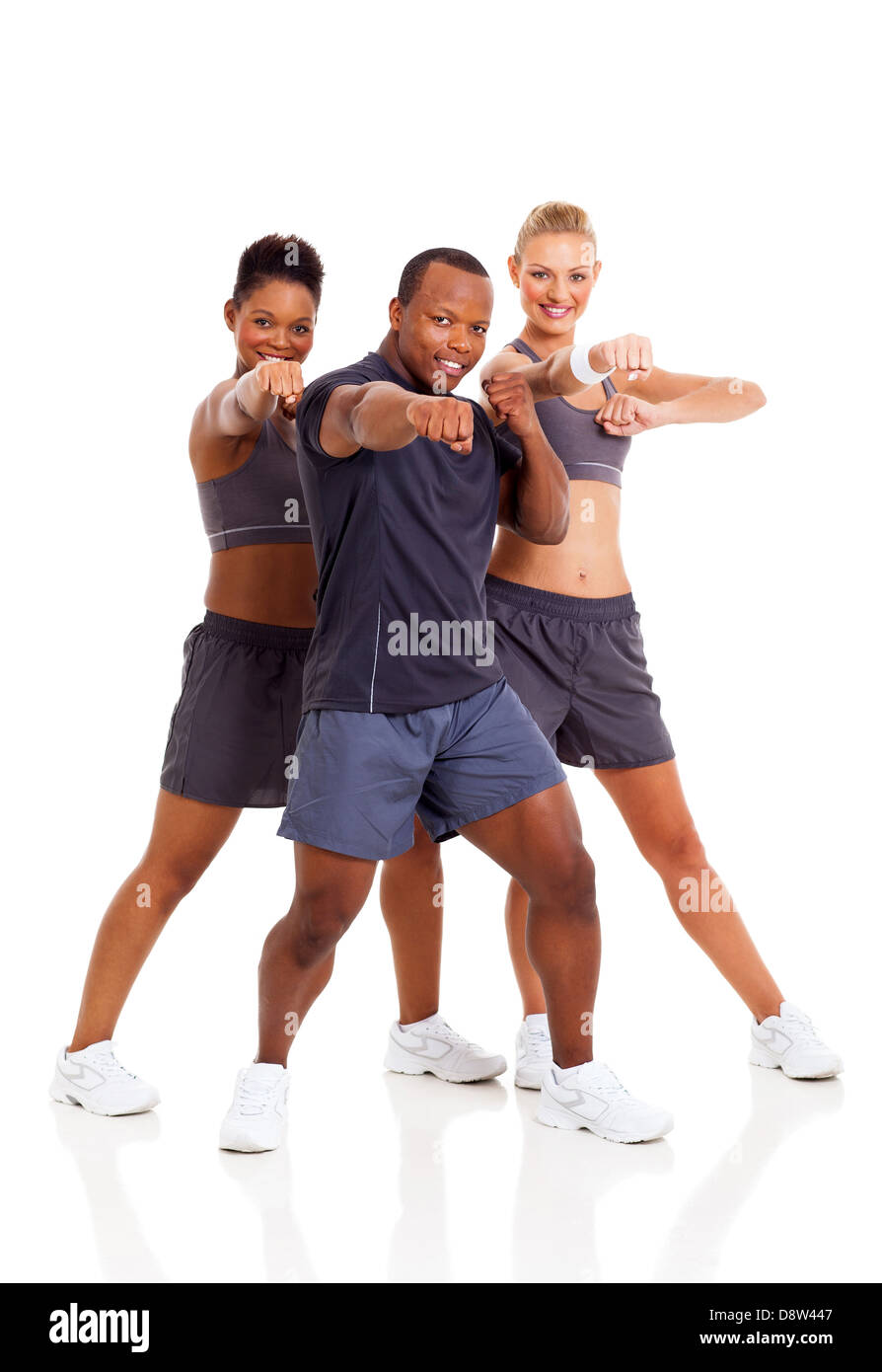 group of fit young adult working out on white background Stock Photo