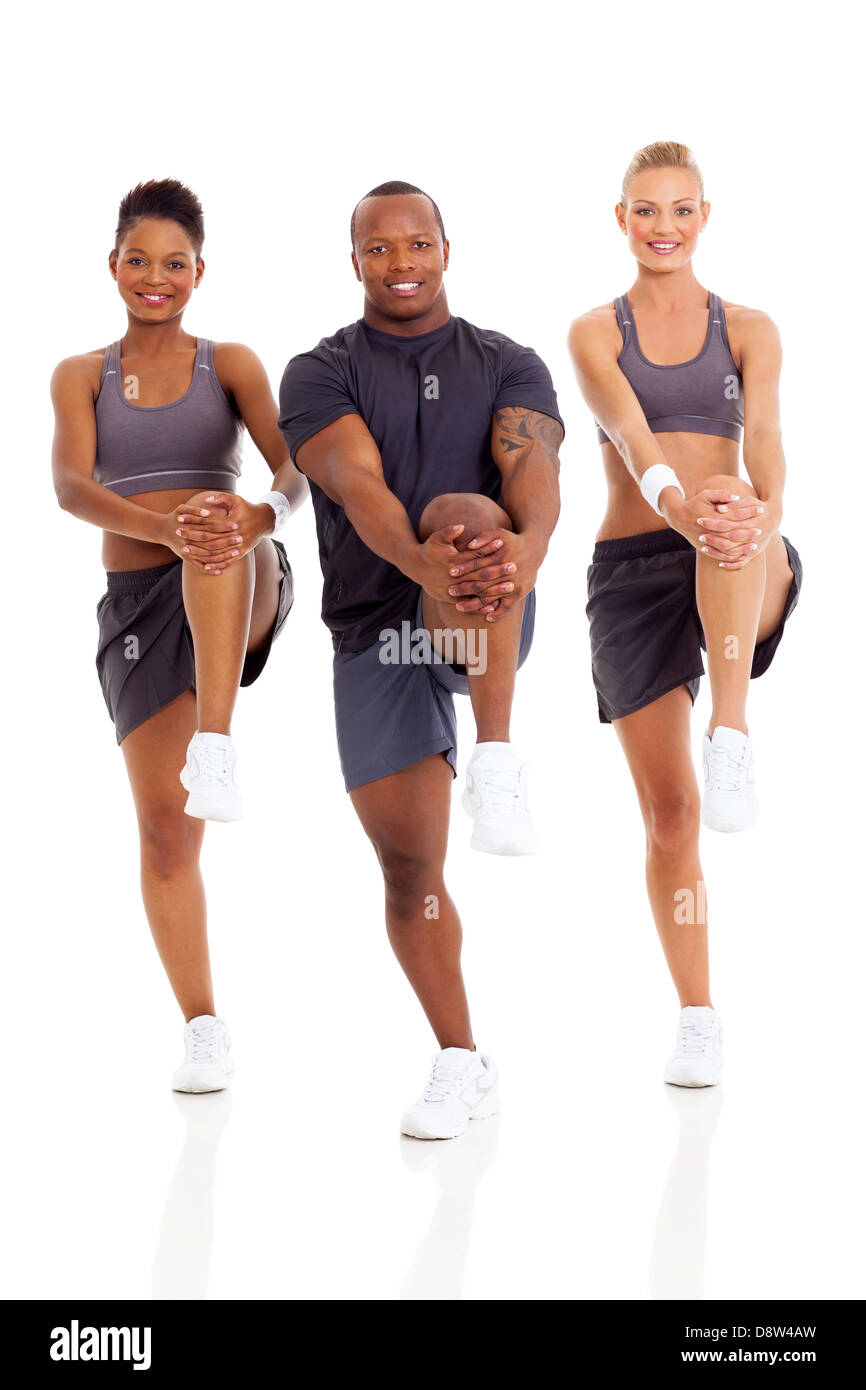 cheerful group of people stretching before working out on white background Stock Photo