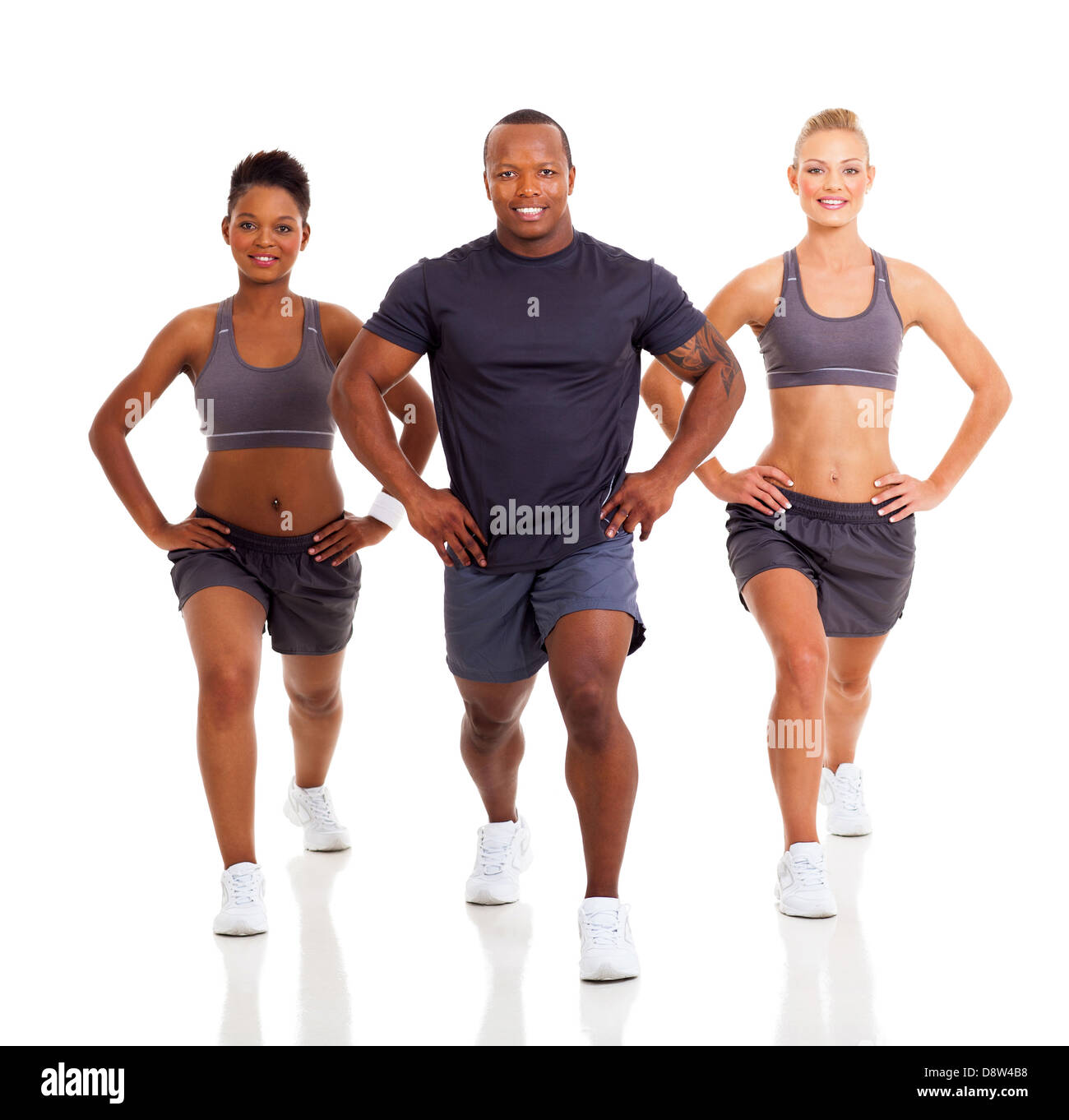 three healthy people exercising on white background Stock Photo - Alamy