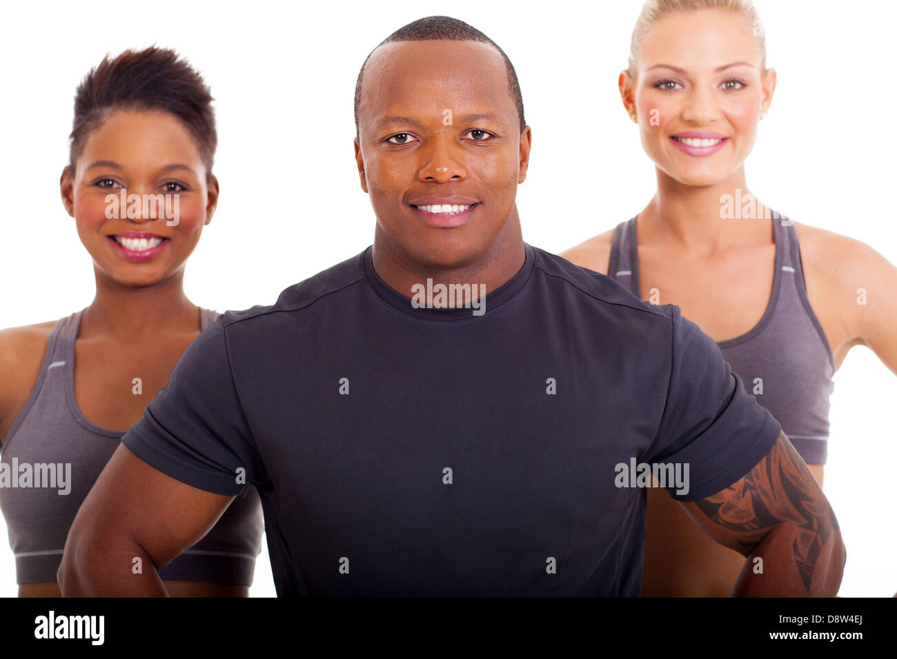 portrait sporty african man and two women on white background Stock Photo