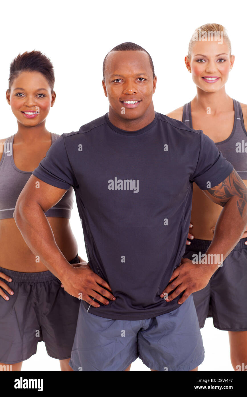 handsome muscular man with two pretty women posing over with background Stock Photo