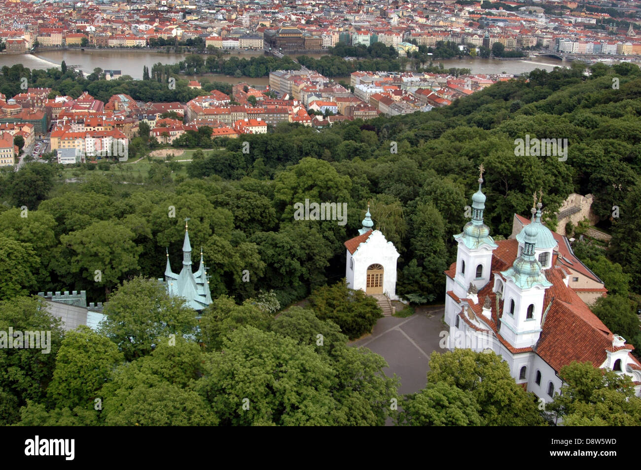 View over city and Church St Lawrence from Rozhledna Observation Tower Prague Czech republic Stock Photo