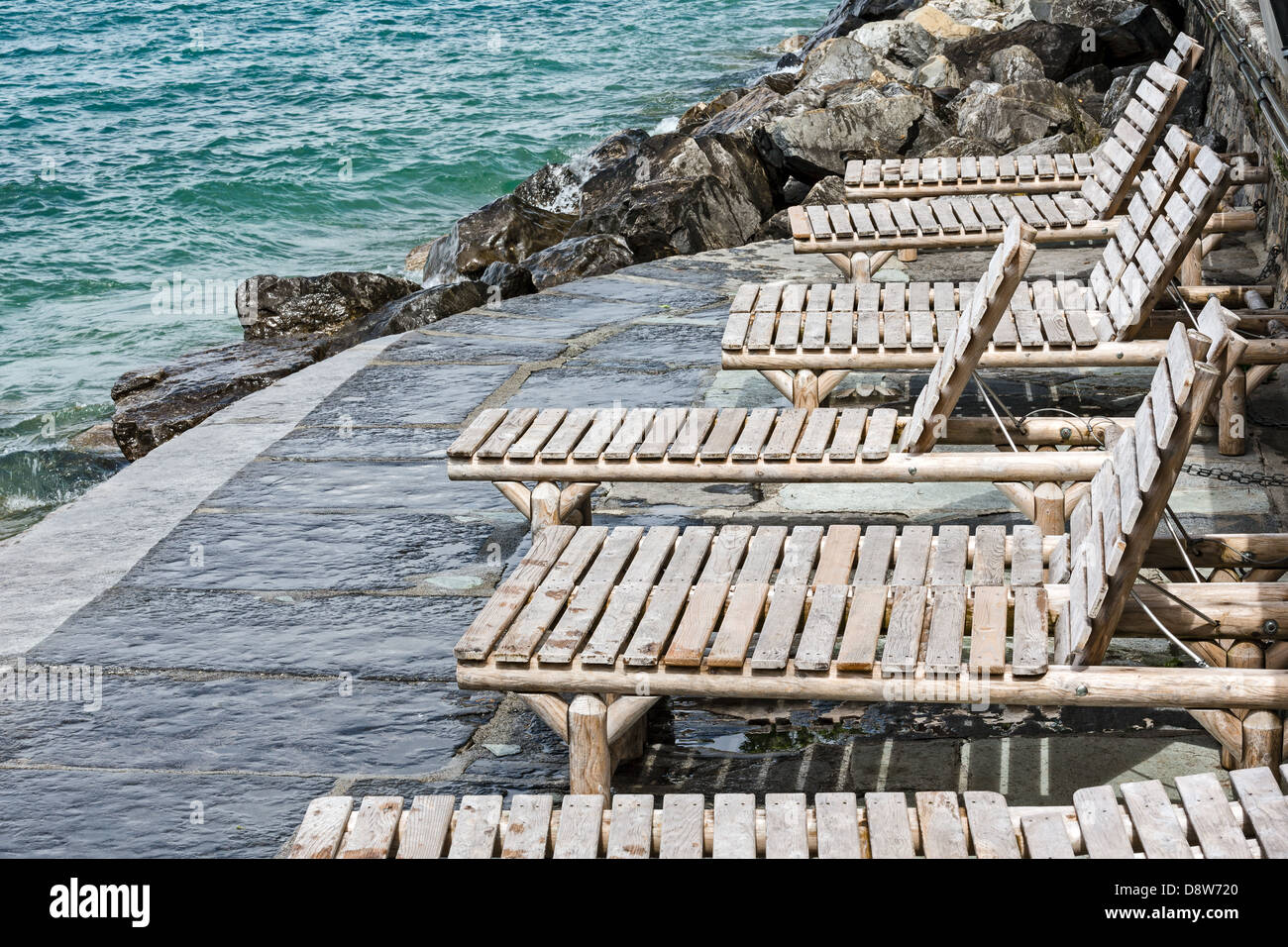 Empty deck chairs on beach hi-res stock photography and images - Alamy
