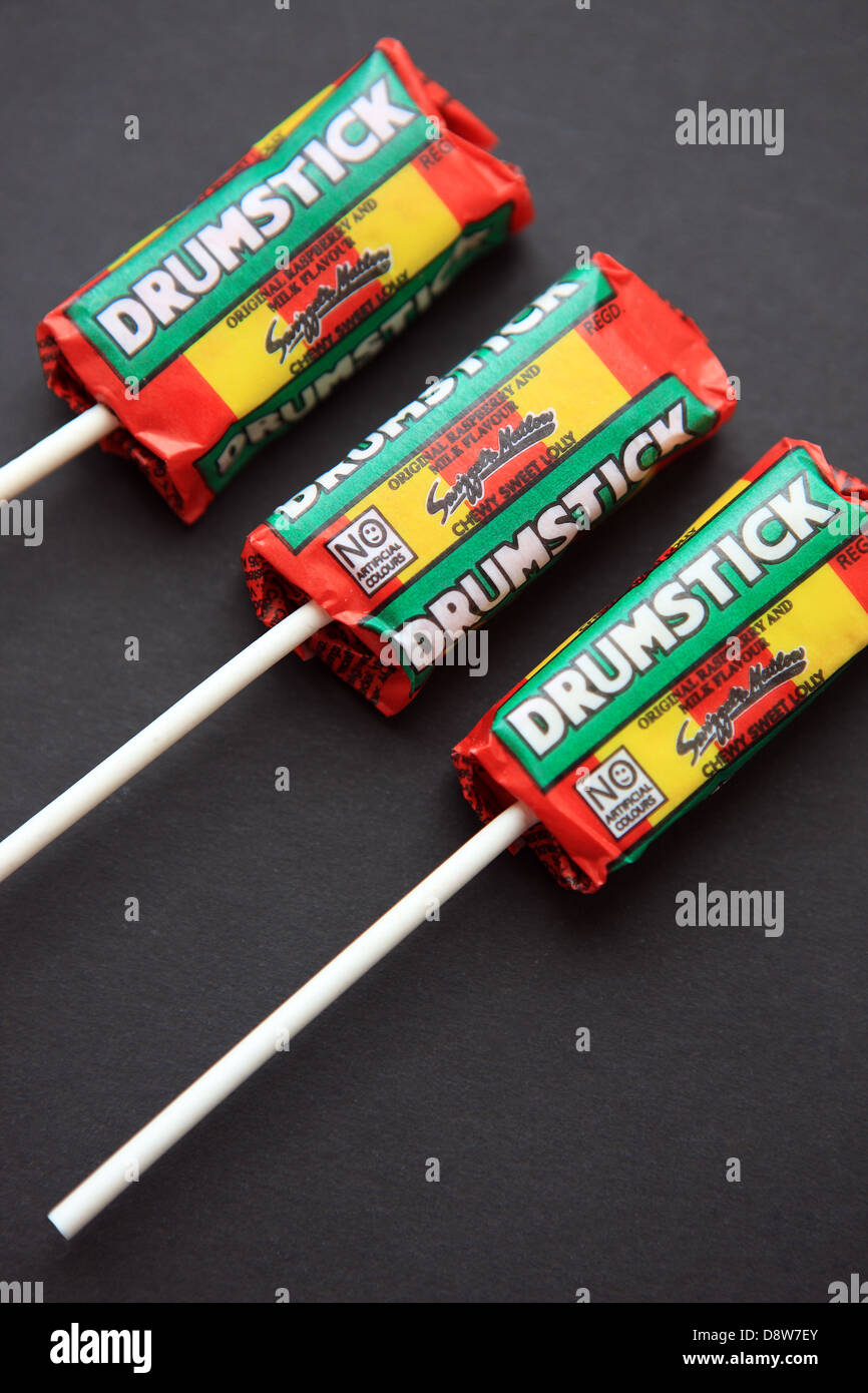Drumstick children's sweets by Swizzles Matlow on a black background Stock Photo