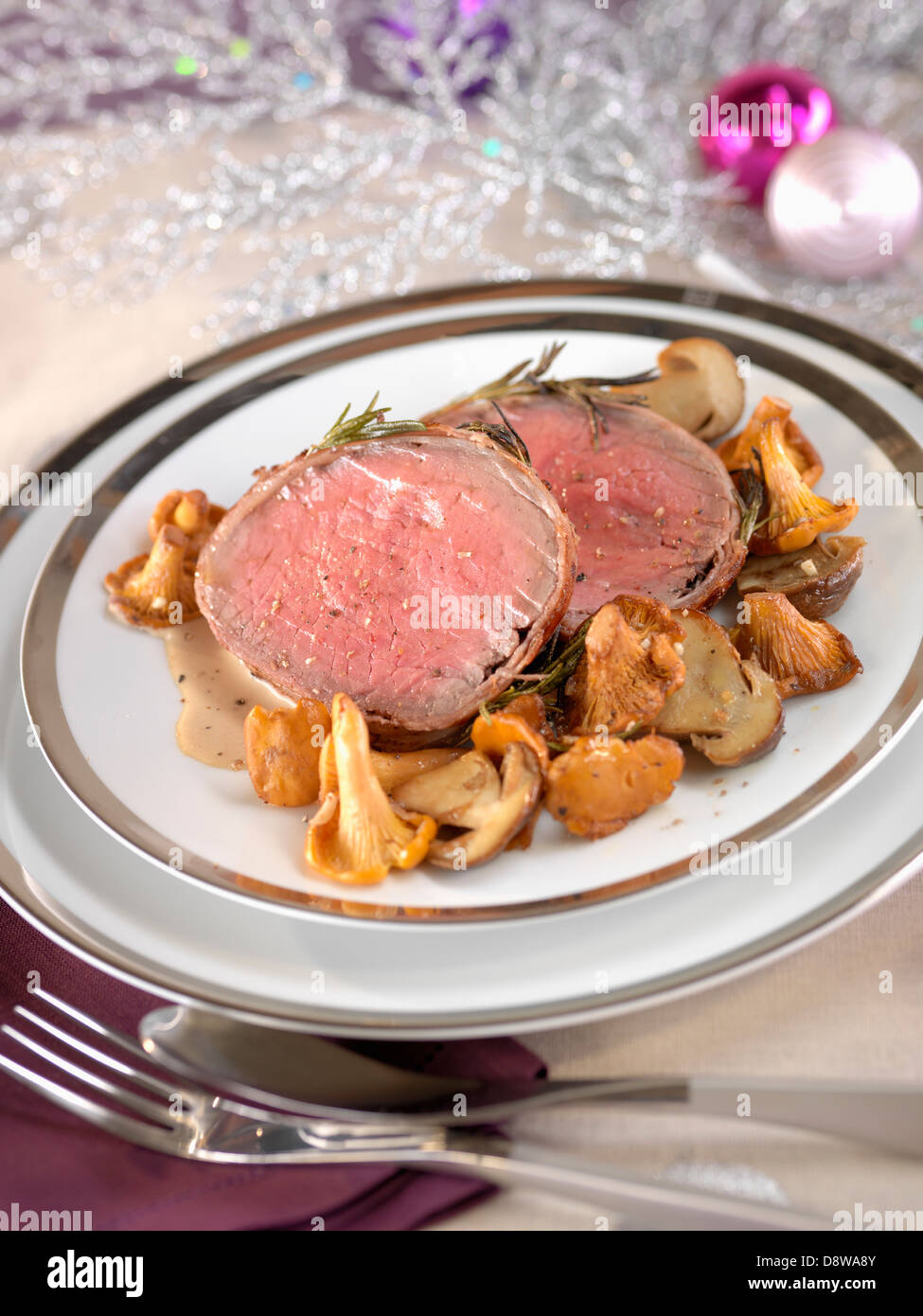Roast beef with mushrooms Stock Photo Alamy