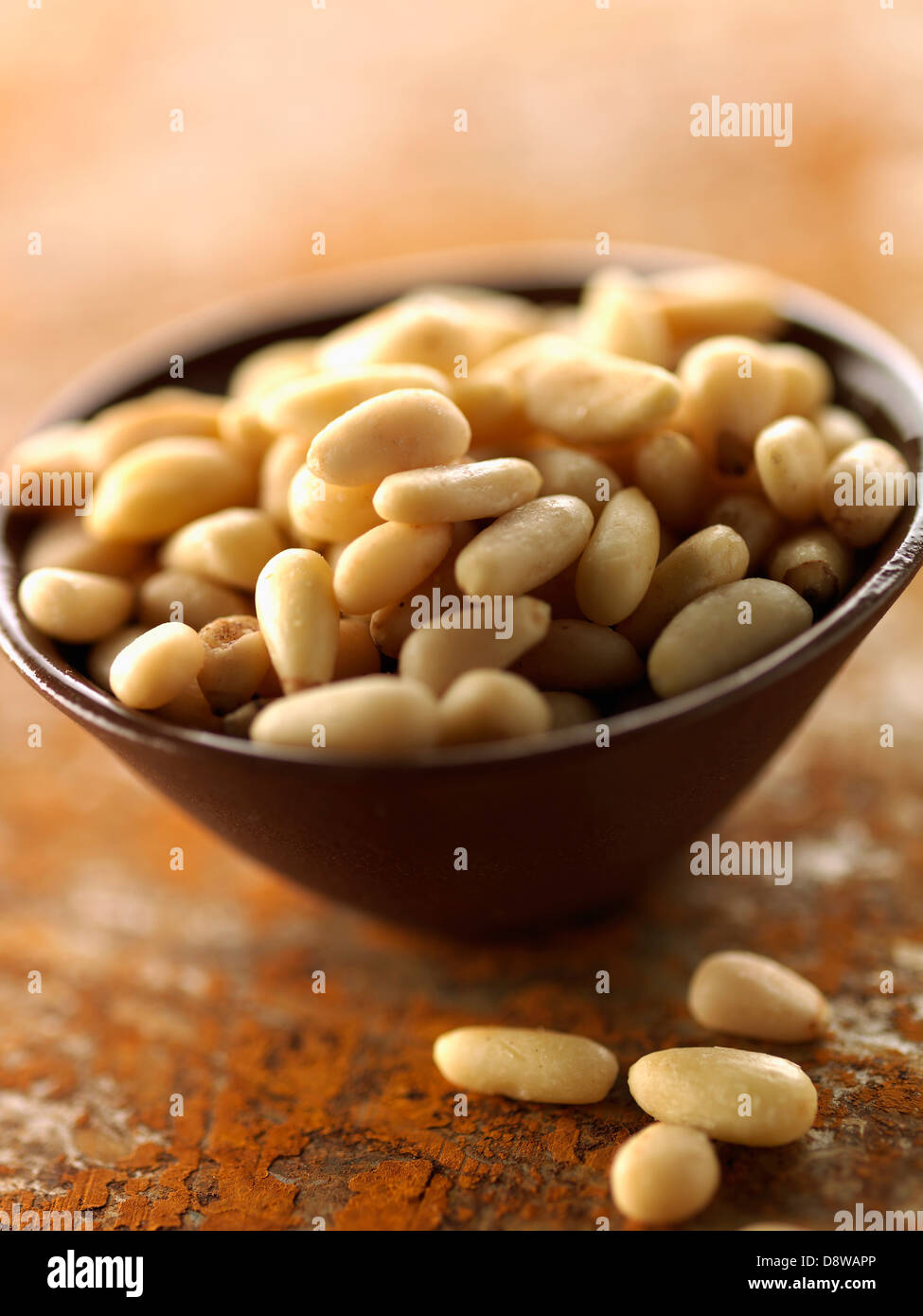 Small bowl of pine nuts Stock Photo
