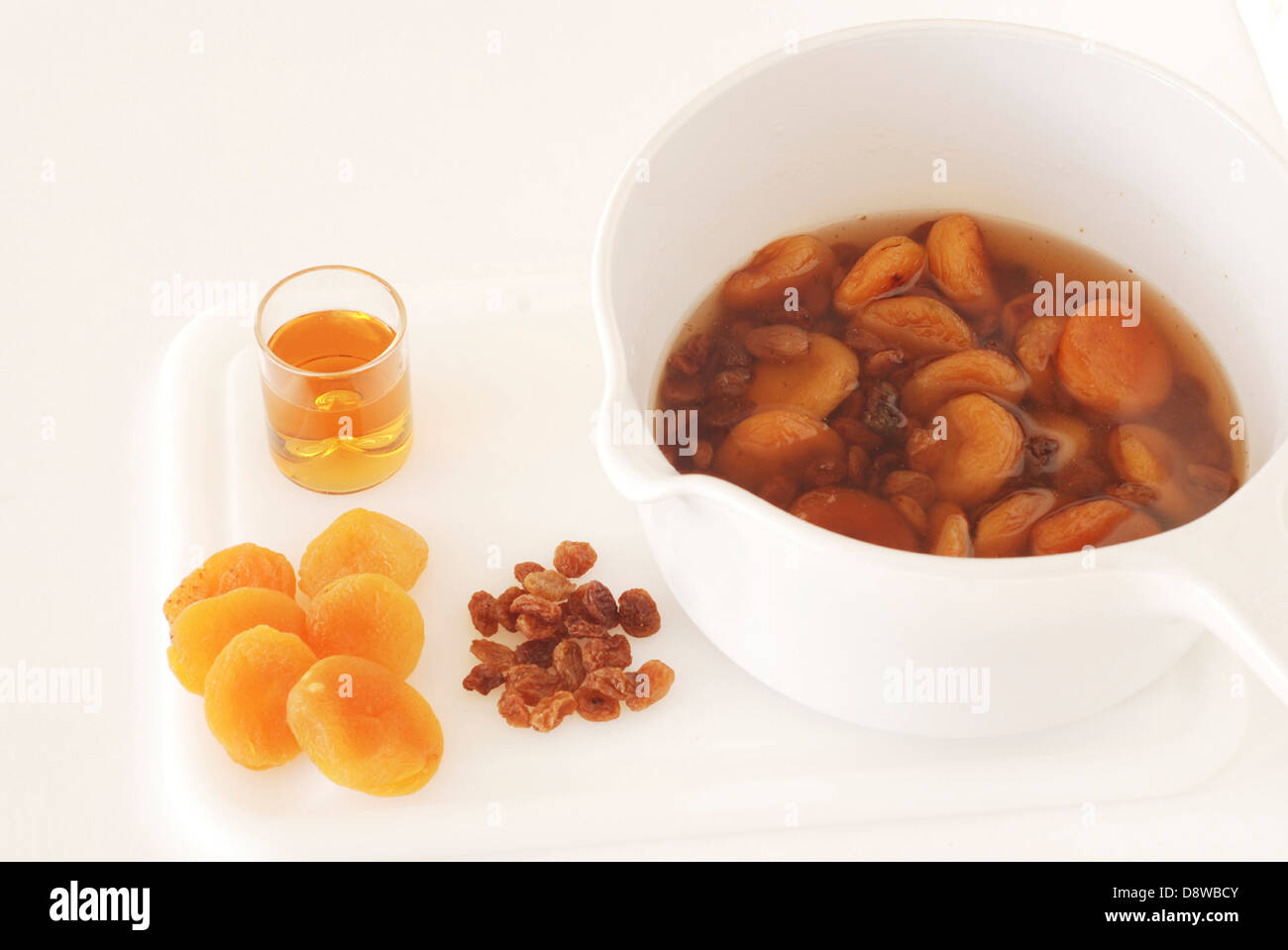 Rehydrating dried fruit Stock Photo Alamy