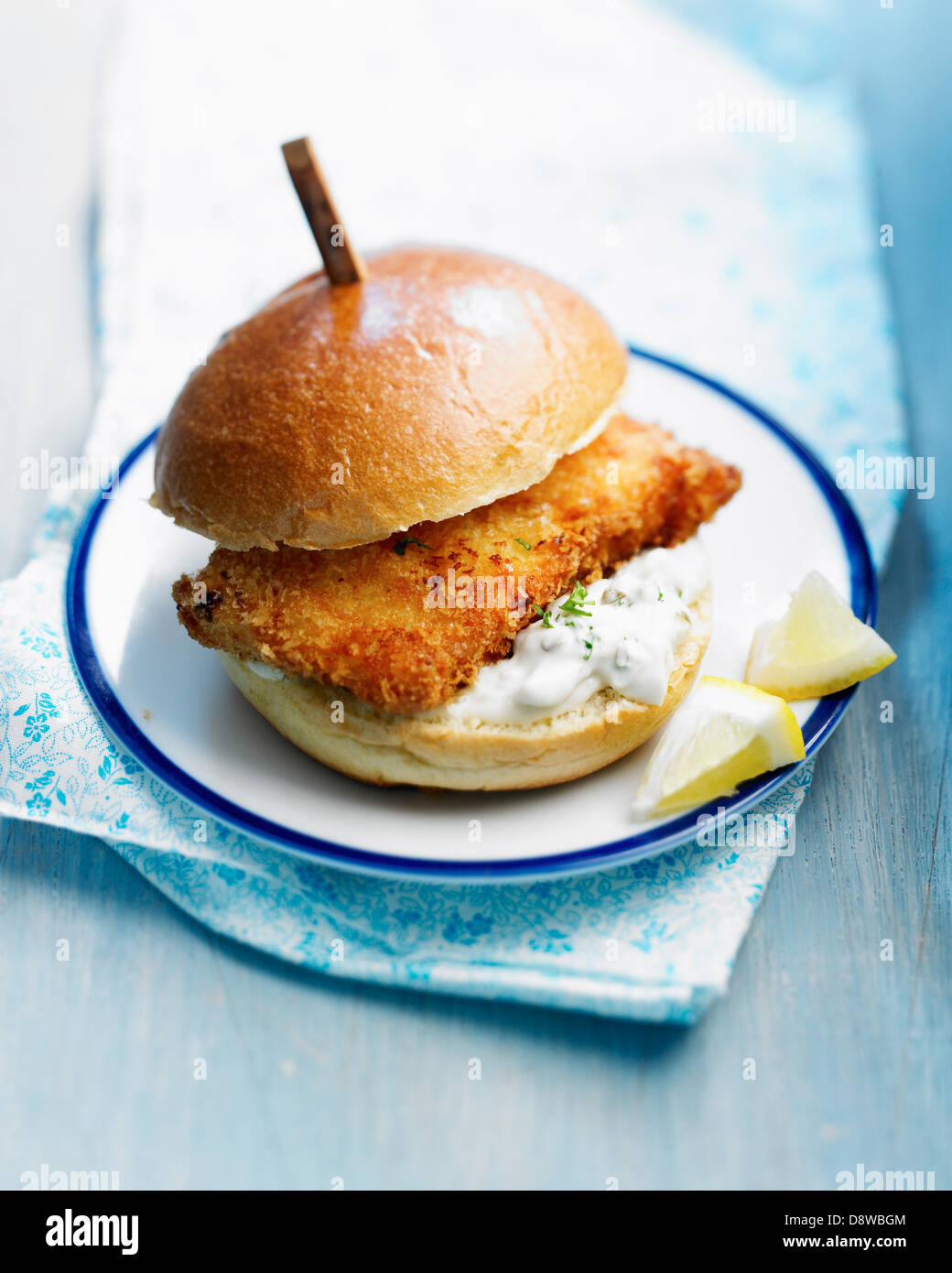 Breaded fried fish and tartare sauce burger Stock Photo Alamy