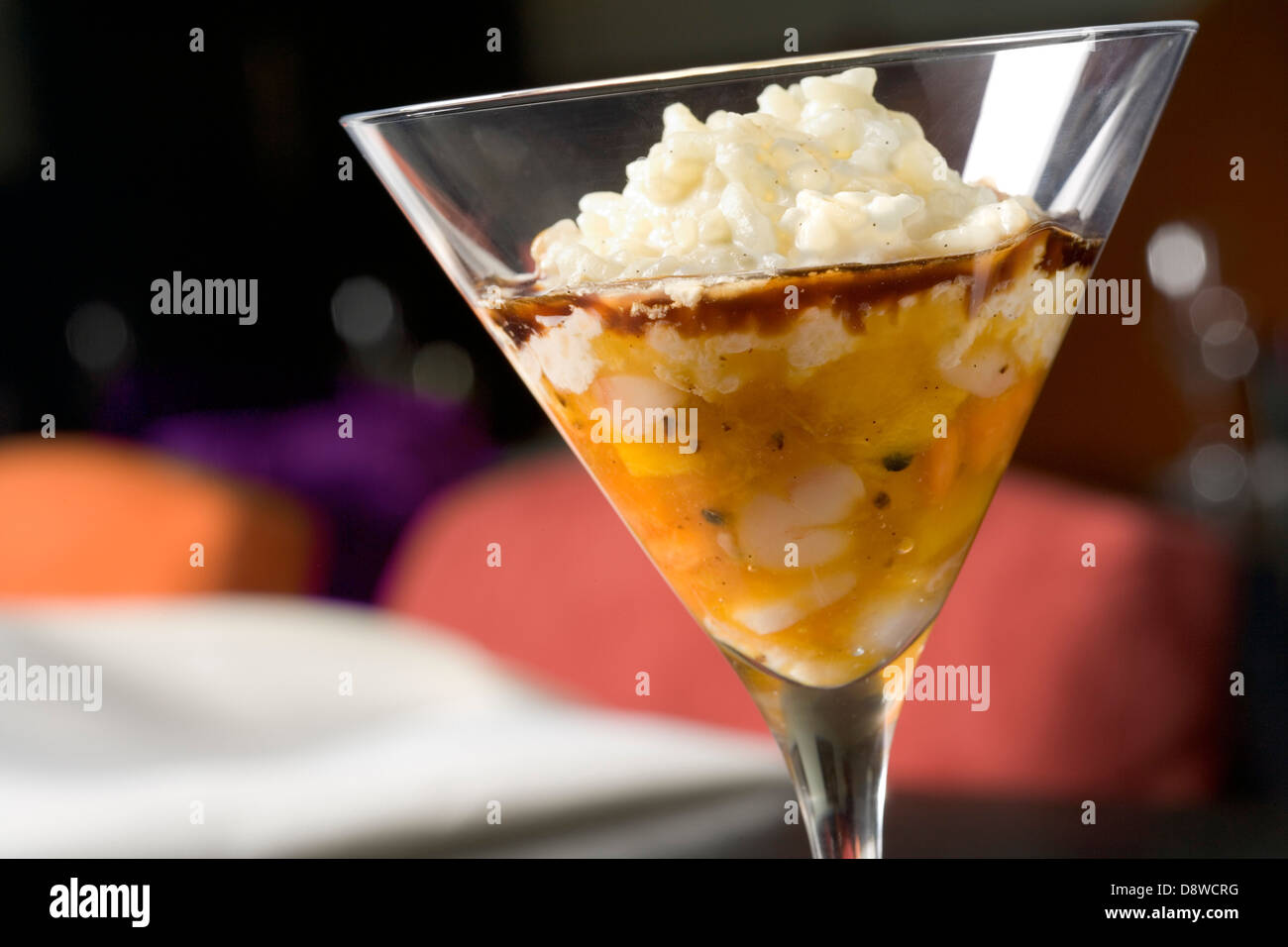 Rice pudding with stewed exotic fruit Stock Photo