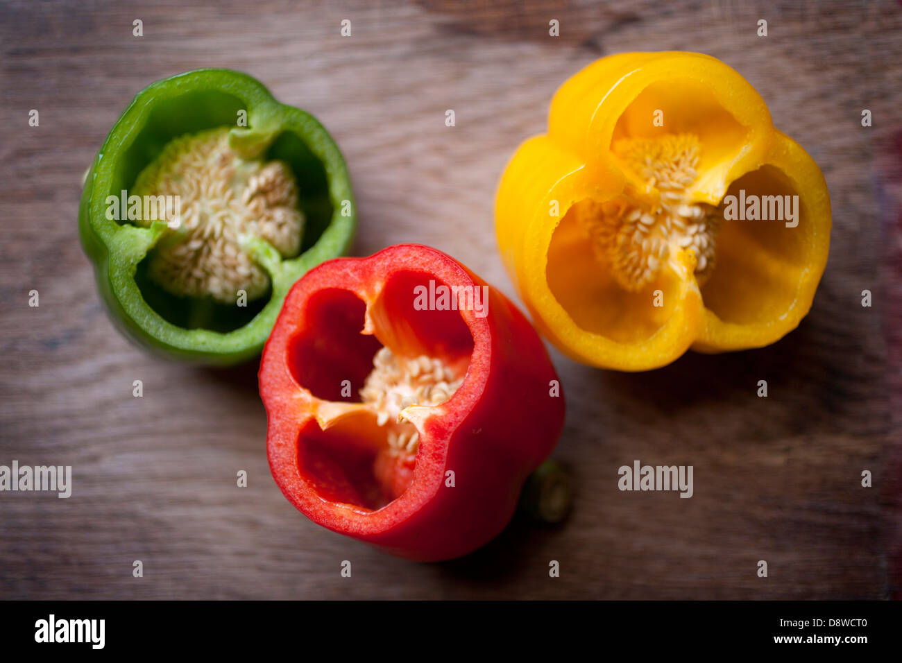 Green,yellow and red bell peppers Stock Photo