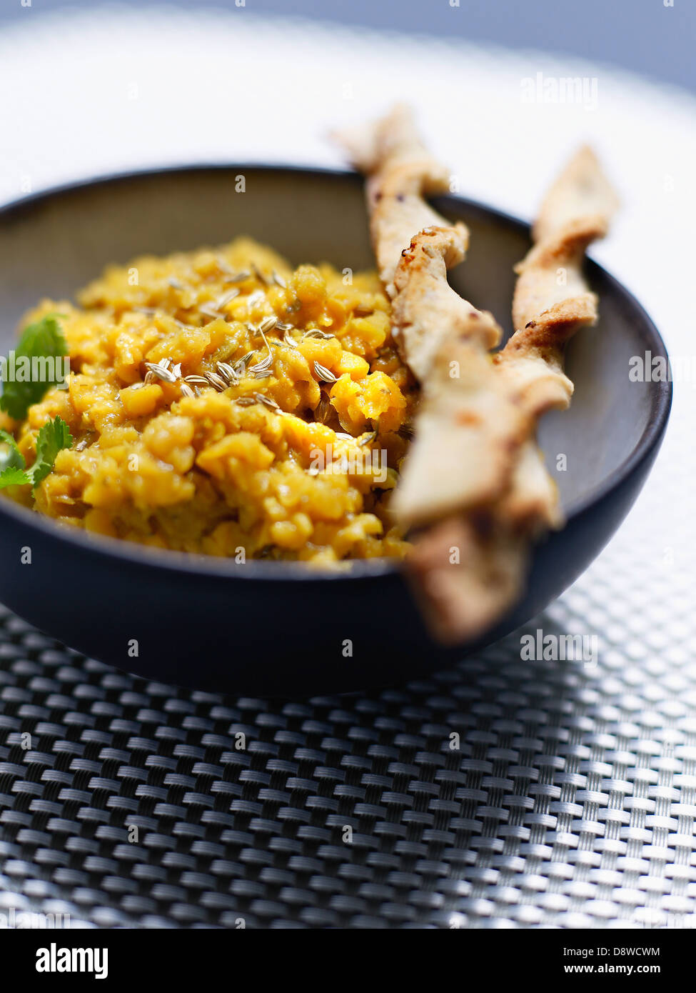 Spicy orange lentils ,quinoa twisted bread sticks Stock Photo Alamy
