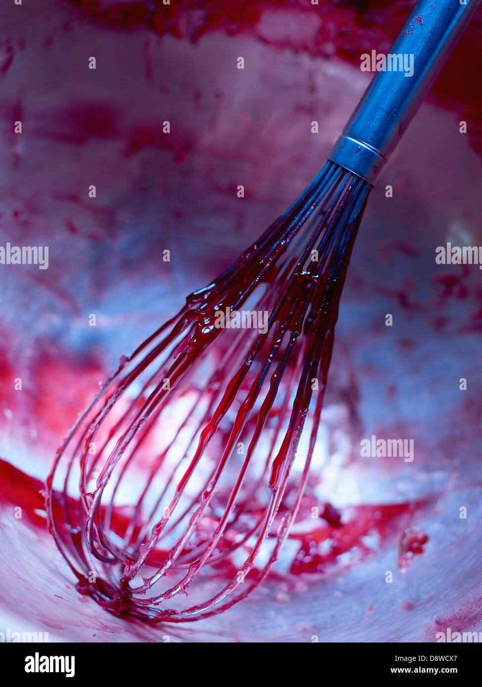 Whisk covered in sugar,fruit pulp and pectin Stock Photo
