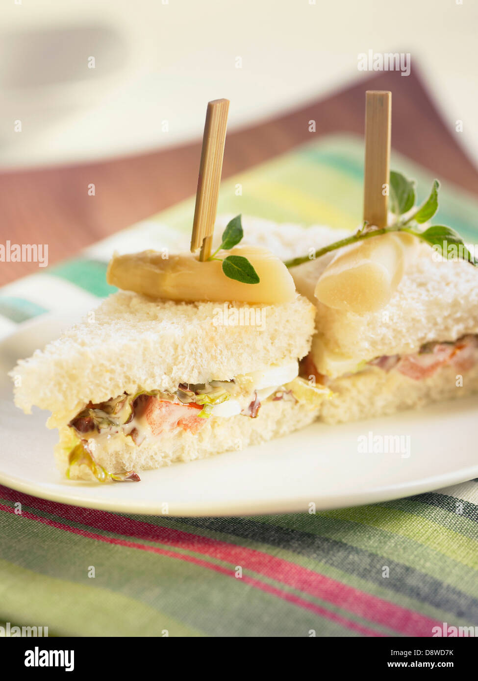 Tuna,white asparagus,eggs,lettuce,tomato and mayonnaise sandwich Stock Photo