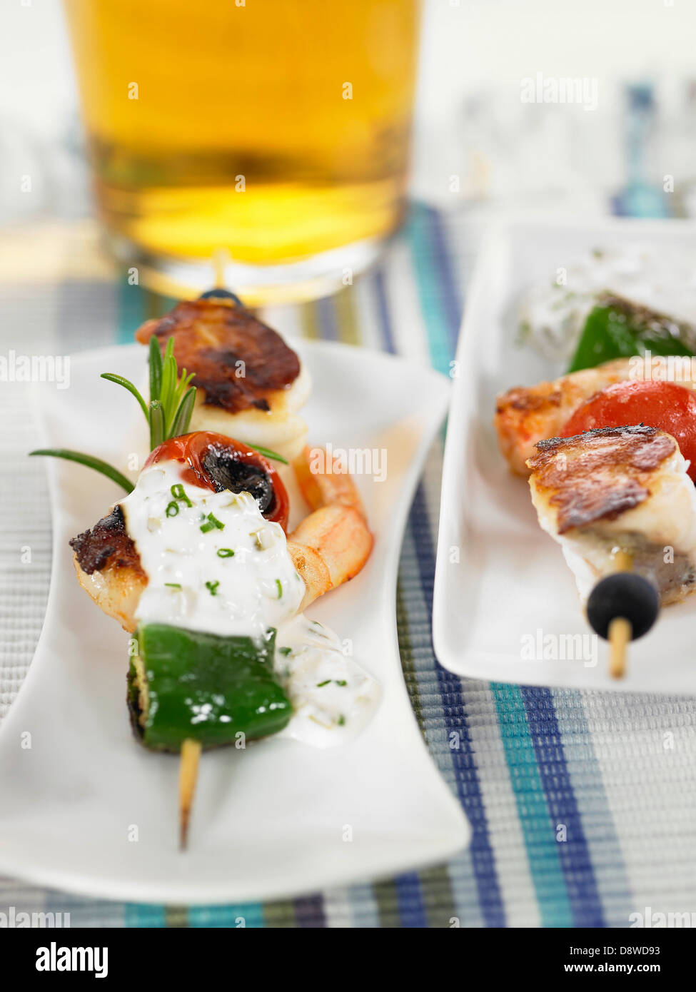 Monkfish,shrimp and tomato brochette with tartare sauce Stock Photo