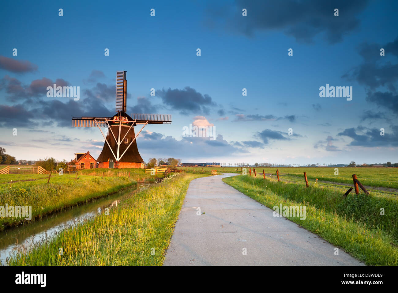 charming Dutch windmill in morning sunshine, Groningen, Holland Stock