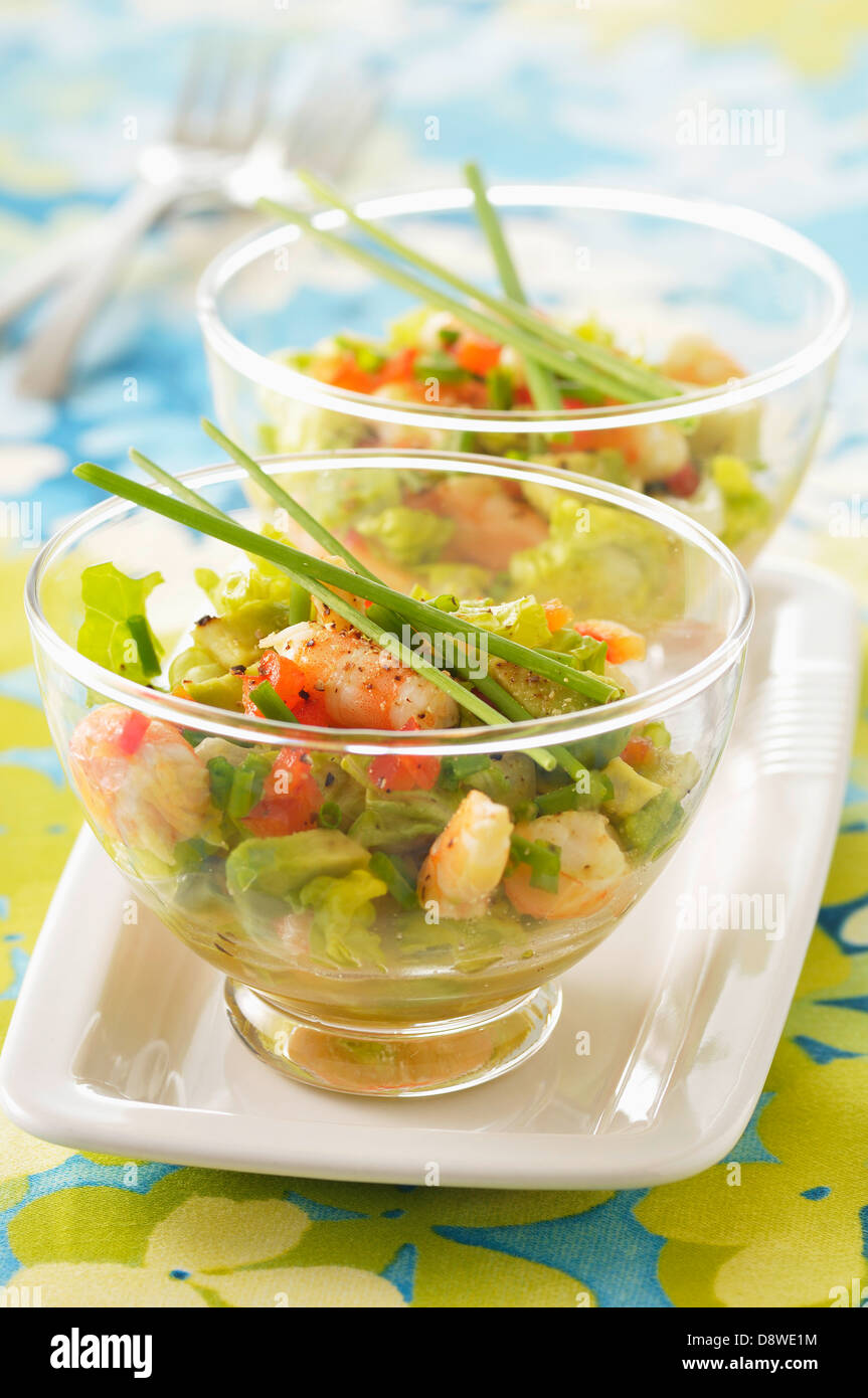 Avocado,shrimp and chive salad with tangerine juice Stock Photo