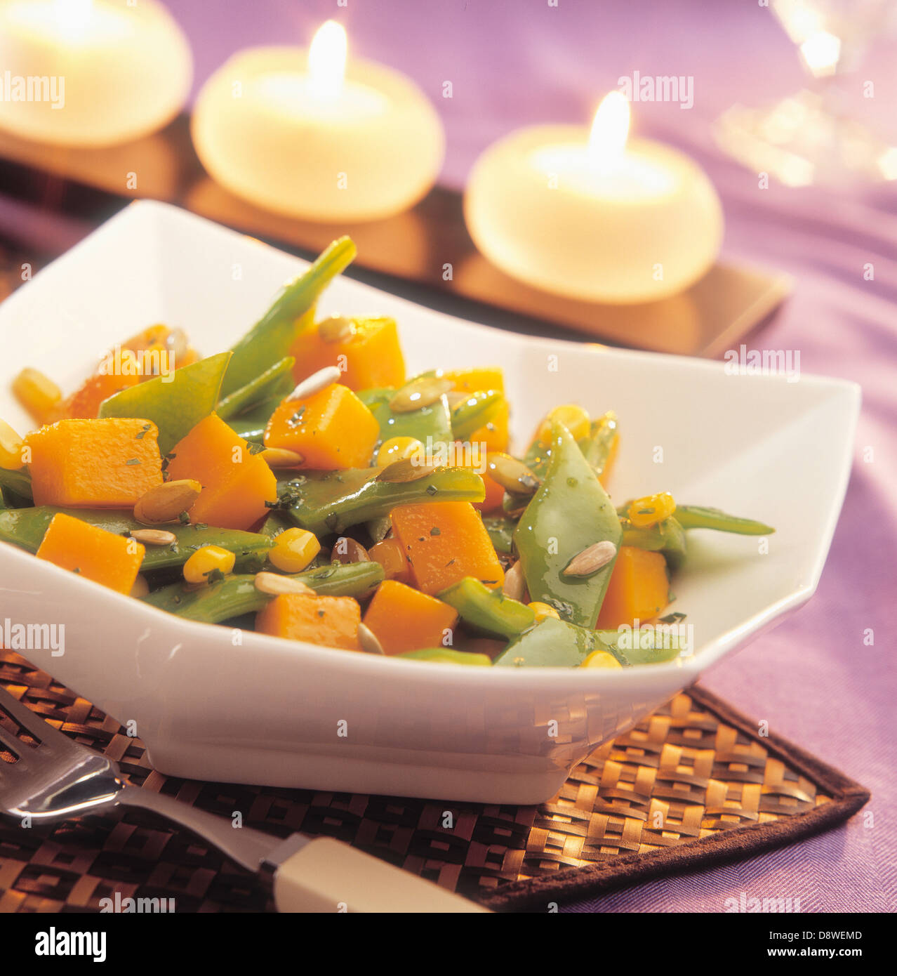 Pumpkin and runner bean stirfry with seeds Stock Photo Alamy