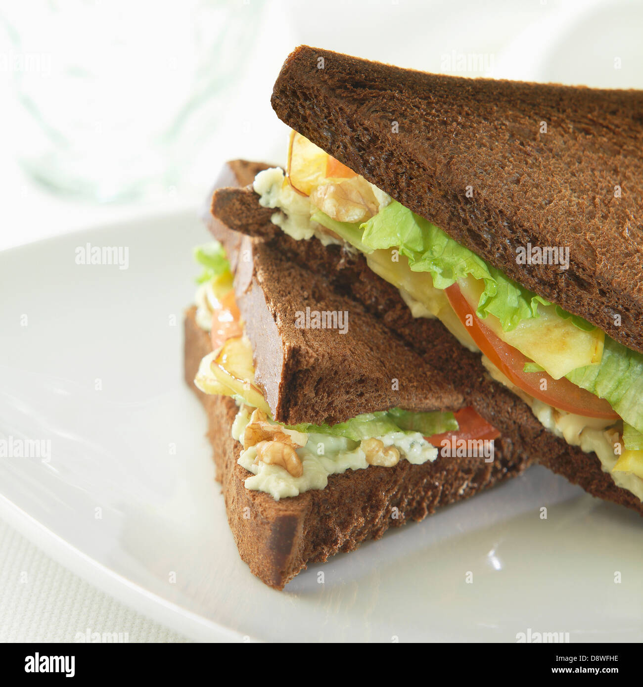 Lettuce,apple and walnut black bread sandwich Stock Photo