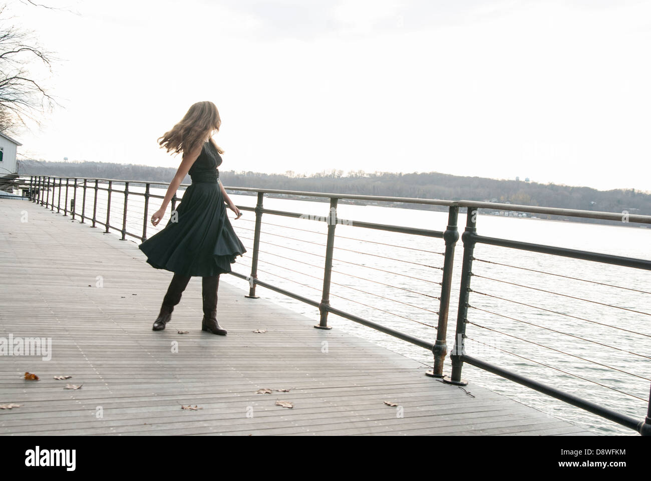 Young woman looking away Stock Photo - Alamy