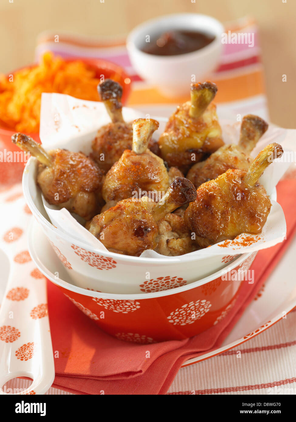 Roast drumsticks with barbecue sauce Stock Photo Alamy