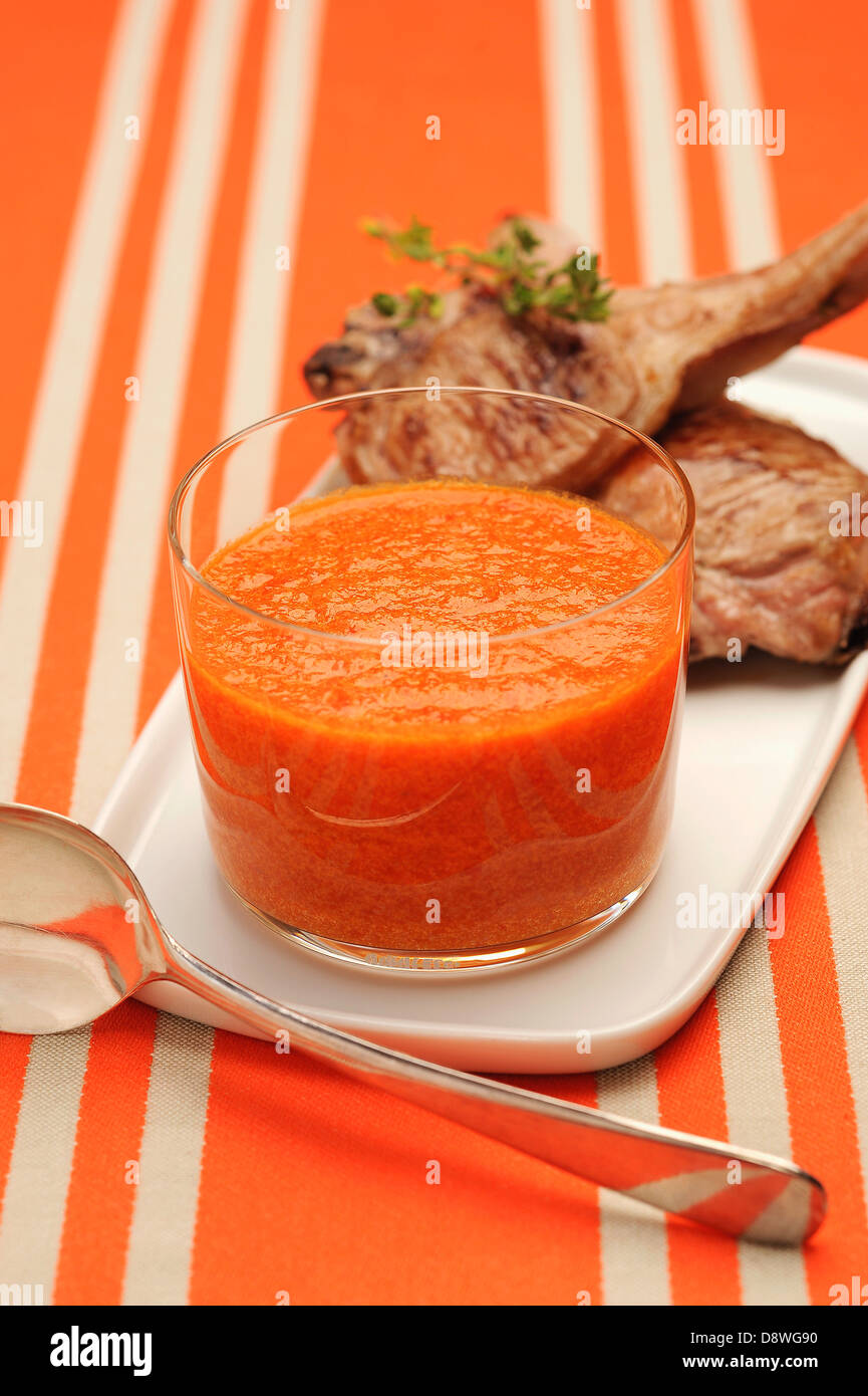 Lamb chops with red pepper mousse Stock Photo