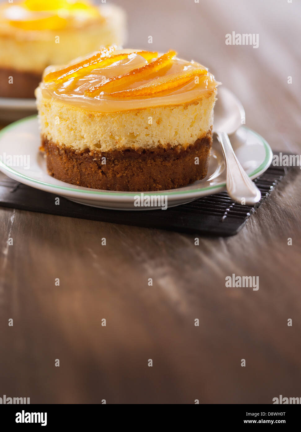 Lime and lemon curd cheesecake Stock Photo Alamy