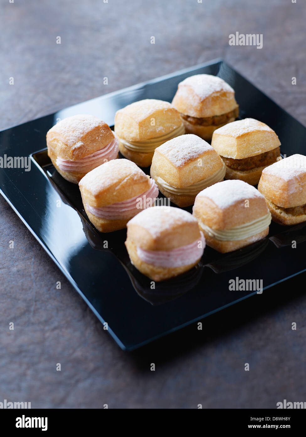 Tray of mini bread sandwiches for a cocktail by Dalloyau Stock Photo