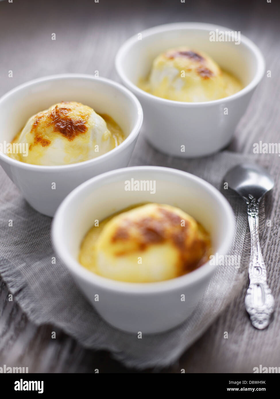 Boiled eggs grilled with bechamel sauce Stock Photo Alamy