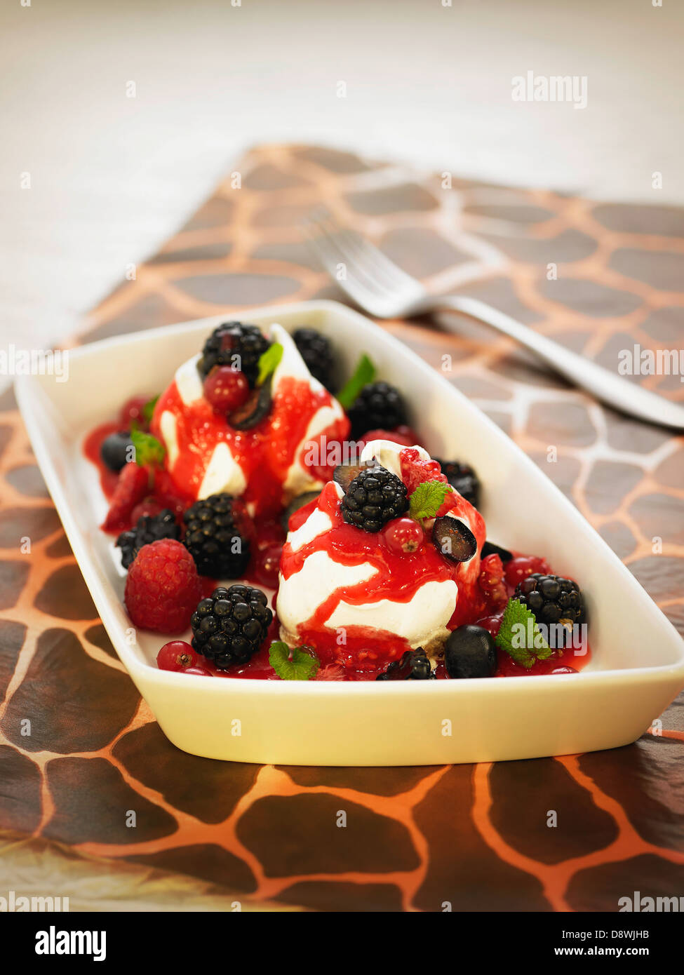 Pavlova with summer fruit Stock Photo