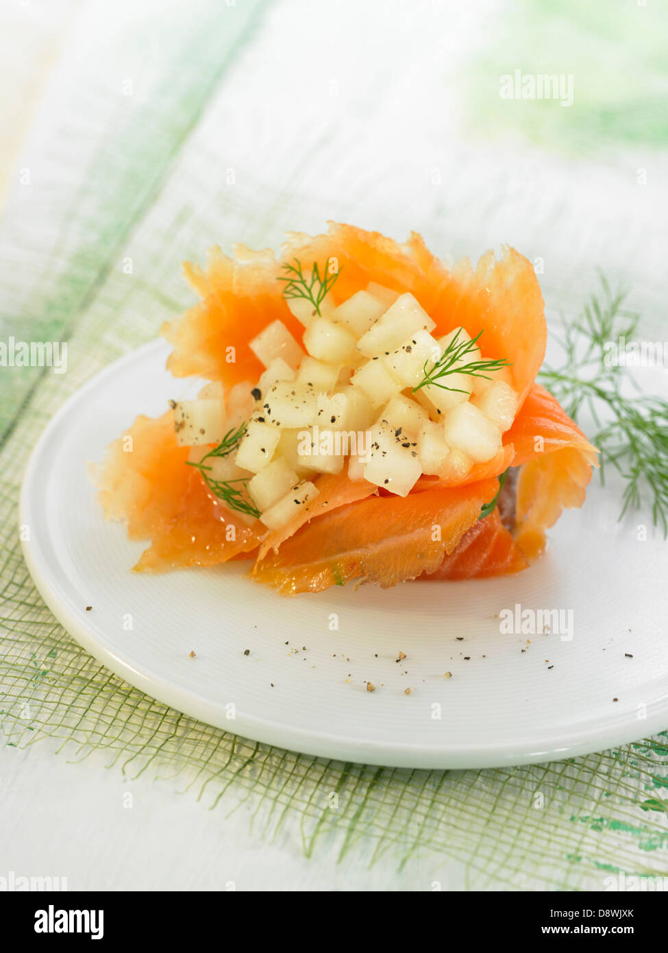 Smoked salmon with diced pears and fennel Stock Photo