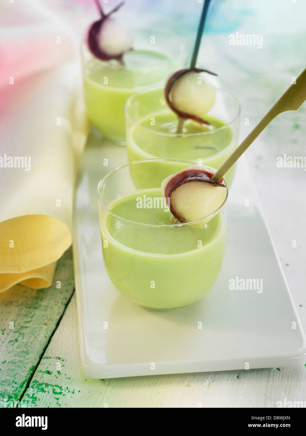 Cream of melon soup with onions and anchovies Stock Photo