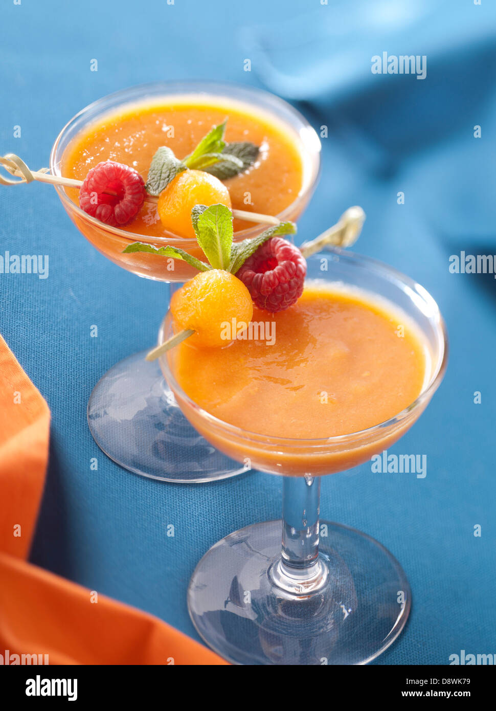 Melon-raspberry soup Stock Photo