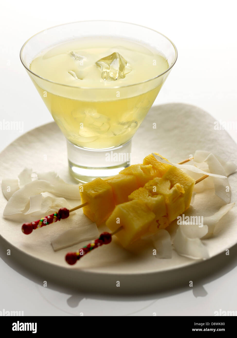 Vodkaginger cocktail with pineapple brochettes Stock Photo Alamy