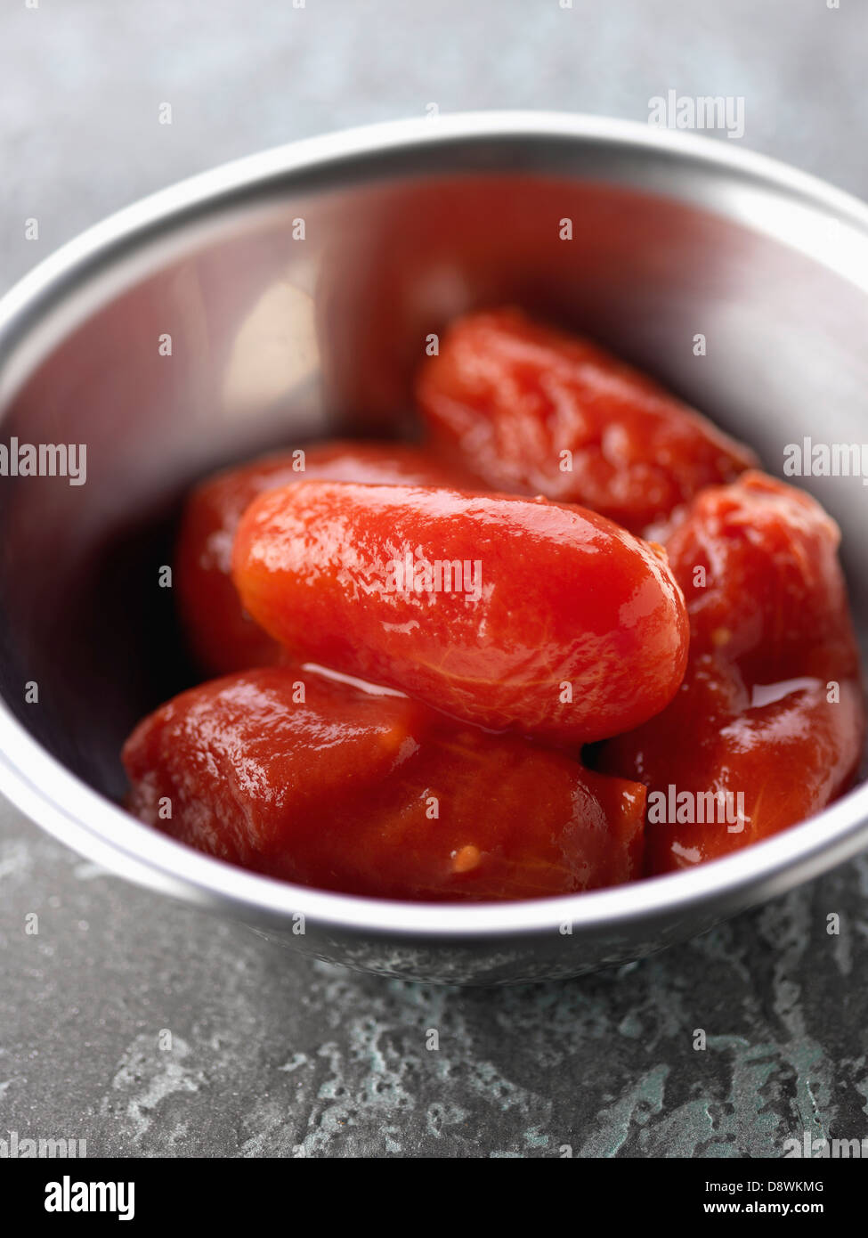 Whole peeled tomatoes Stock Photo Alamy