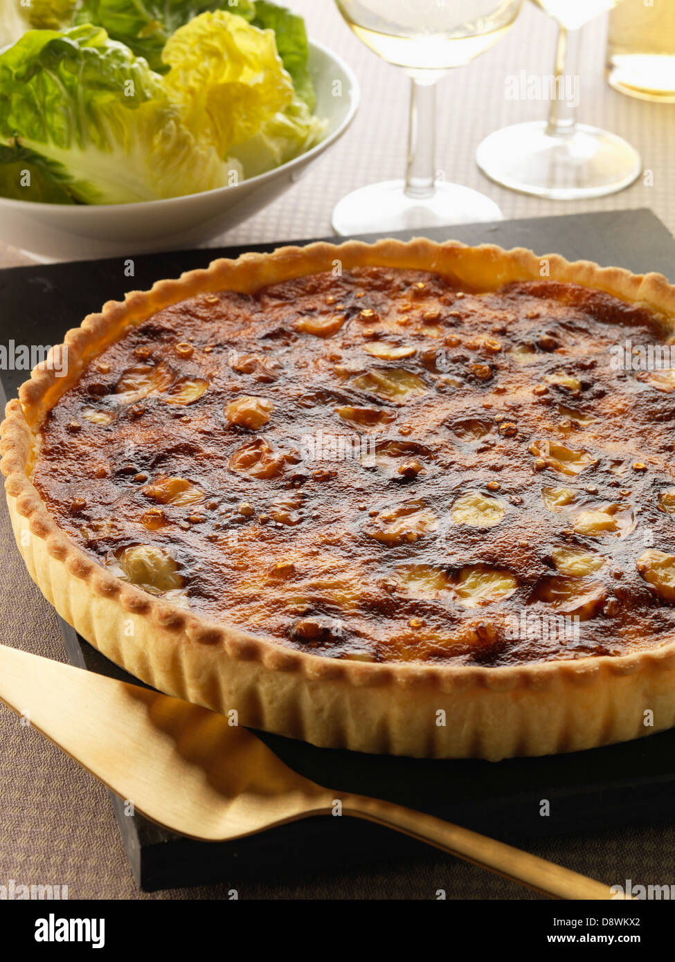 Chicory and Maroilles cheese savoury tart Stock Photo