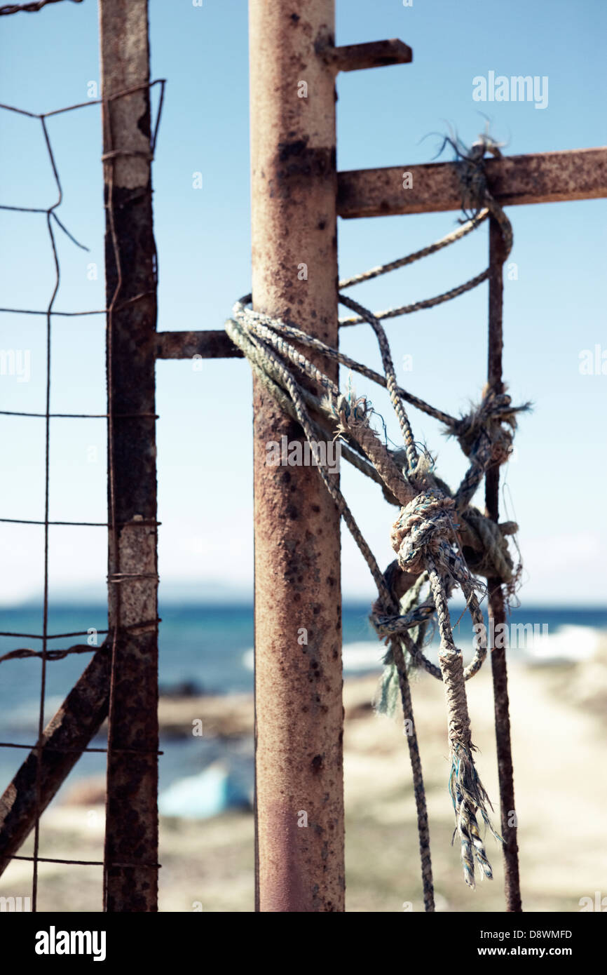 Fence on beach Stock Photo