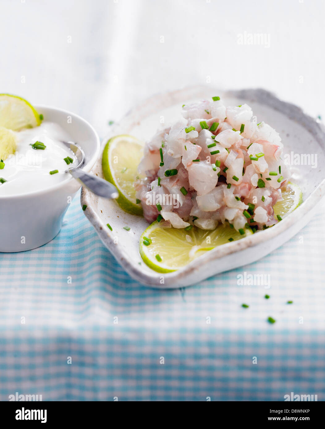 Sea bass Tartare with lime Stock Photo Alamy