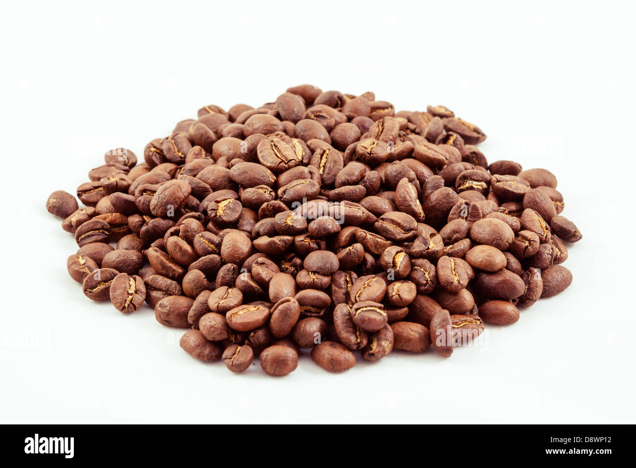 An isolated pile of coffee beans before grinding Stock Photo Alamy