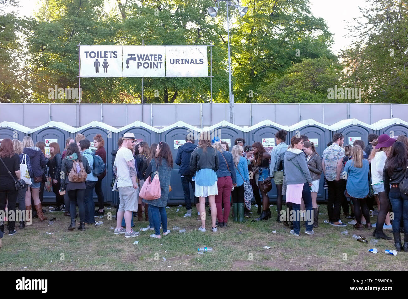 Queues for toilets at a pop/rock festival. (Field Day) Stock Photo