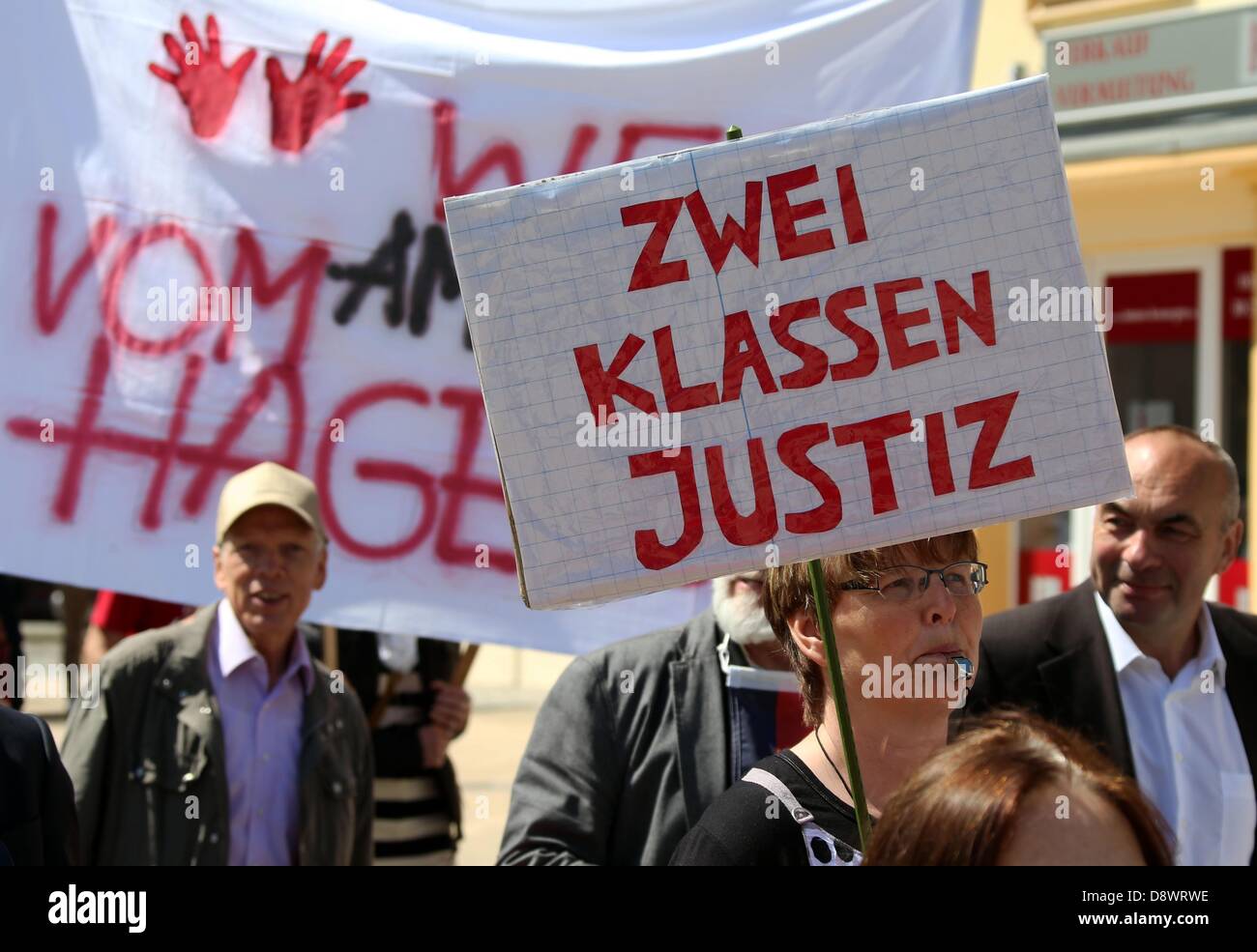Judges, lawyers and further justice employees protest against the structural court reform planned by the state of Mecklenburg-Western Pomerania in Schwerin, Germany, 05 June 2013. The judge's association, the Chamber of lawyers, the association of civil servants and the tariff union called for the demonstration. Photo: Jens Büttner Stock Photo